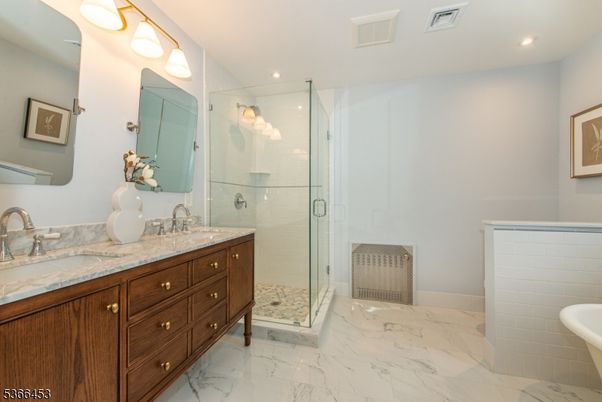 Bathroom, Dual Sink Vanities, Glass Shower, Interior, Marble, Recessed Lighting
