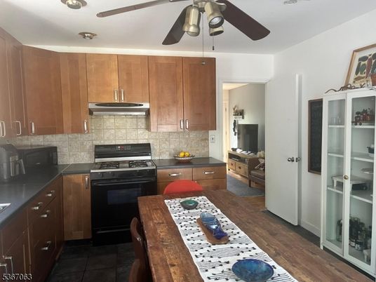 Interior, Kitchen, Tile Countertops, Wood Texture Flooring