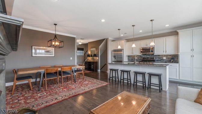Dining room, Interior, Kitchen, Pendant Lights, Recessed Lighting, Stainless Steel Appliances, Wood Texture Flooring