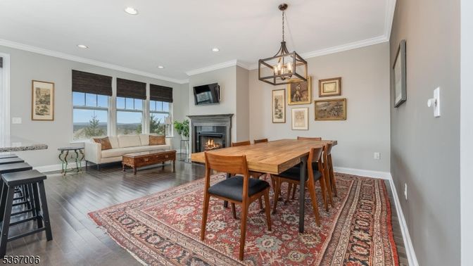 Dining room, Fireplace, Interior, Living room, Pendant Lights, Recessed Lighting, Wood Texture Flooring