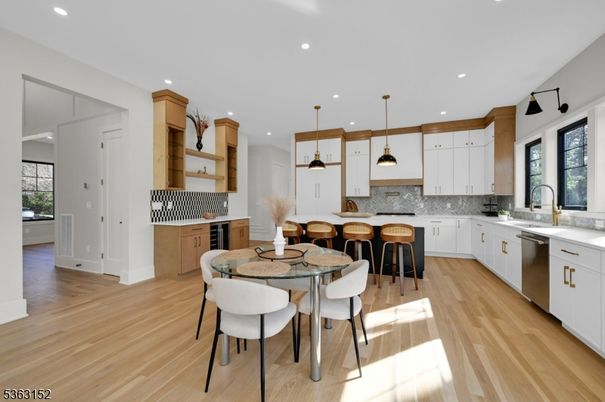 Dining room, Interior, Kitchen, Pendant Lights, Recessed Lighting, Stainless Steel Appliances, Wood Texture Flooring
