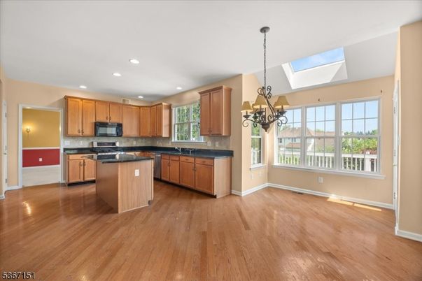 Chandelier, Interior, Kitchen, Recessed Lighting, Stainless Steel Appliances, Wood Texture Flooring