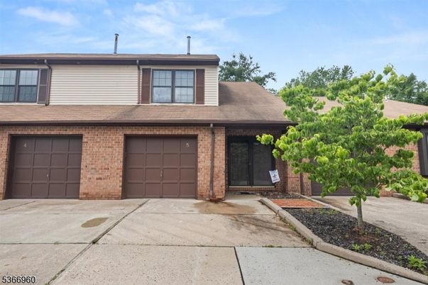 Attached, Exterior, Facade, Brick Facade, Modern