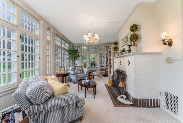 Chandelier, Fireplace, Interior, Living room