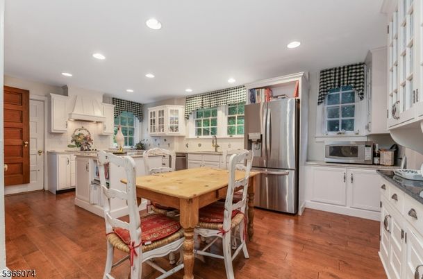Dining room, Interior, Kitchen, Recessed Lighting, Stainless Steel Appliances, Wood Texture Flooring