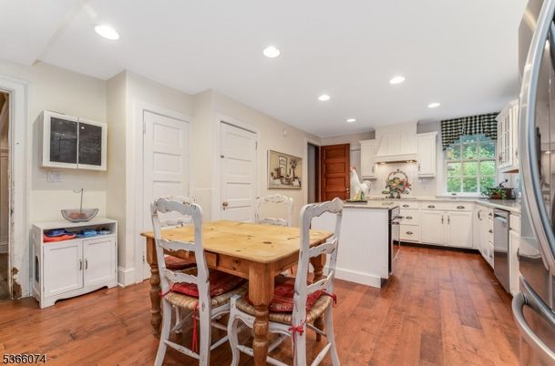 Dining room, Interior, Kitchen, Recessed Lighting, Stainless Steel Appliances, Wood Texture Flooring