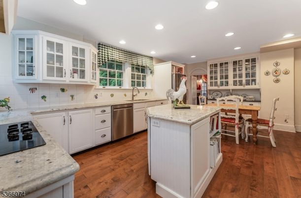 Dining room, Interior, Kitchen, Recessed Lighting, Stainless Steel Appliances, Wood Texture Flooring