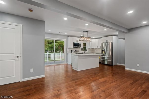 Chandelier, Interior, Kitchen, Pendant Lights, Recessed Lighting, Stainless Steel Appliances, Wood Texture Flooring