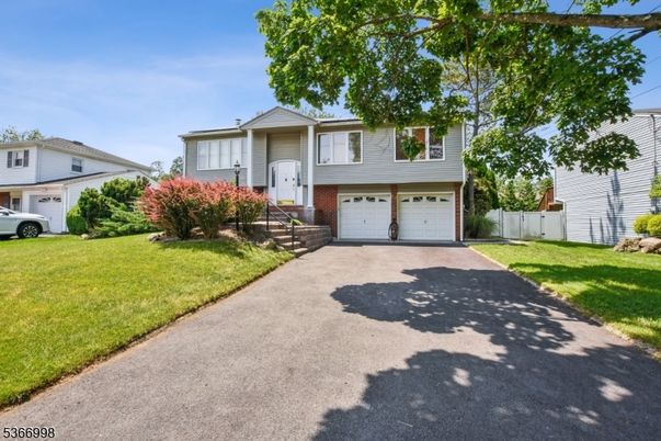 Attached, Exterior, Facade, Raised Ranch