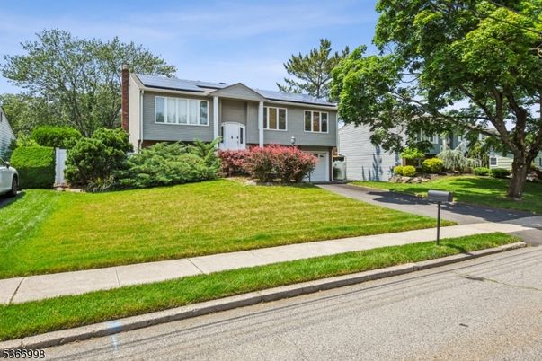 Attached, Exterior, Facade, Solar Panels, Raised Ranch