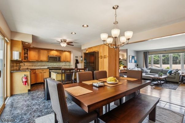 Chandelier, Dining room, Interior, Kitchen, Living room, Recessed Lighting, Wood Texture Flooring