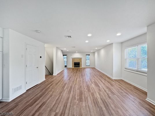 Empty room, Fireplace, Interior, Recessed Lighting, Wood Texture Flooring