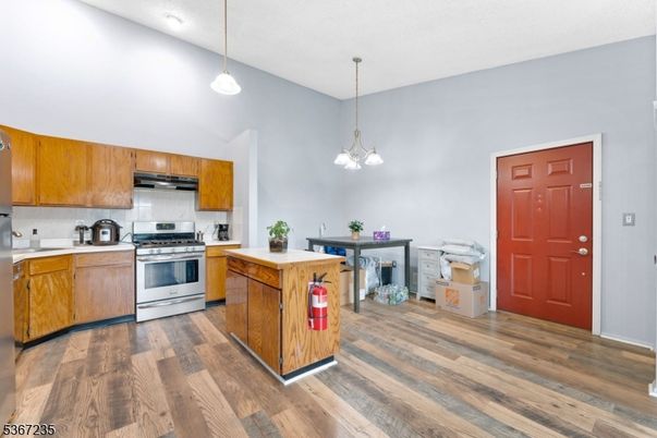 Interior, Kitchen, Pendant Lights, Stainless Steel Appliances, Wood Texture Flooring