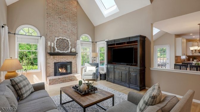 Fireplace, Interior, Living room, Recessed Lighting, Stone Walls, Wood Texture Flooring