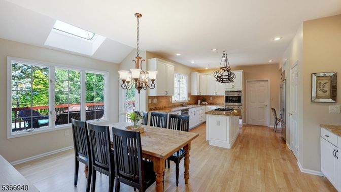 Chandelier, Dining room, Interior, Kitchen, Recessed Lighting, Stainless Steel Appliances, Wood Texture Flooring