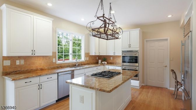 Chandelier, Interior, Kitchen, Recessed Lighting, Stainless Steel Appliances, Wood Texture Flooring