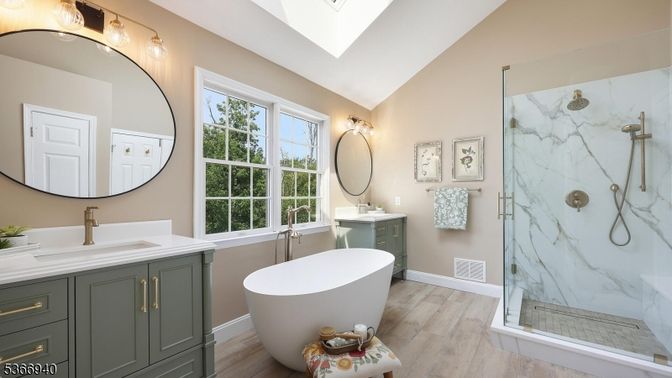 Bathroom, Dual Sink Vanities, Free Standing Baths, Glass Shower, Interior, Marble Walls, Wood Texture Flooring