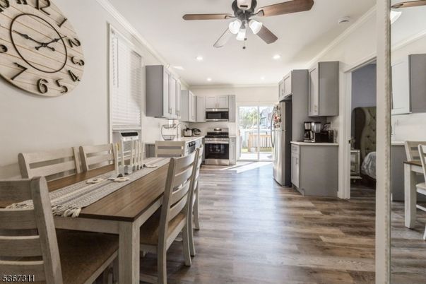 Dining room, Interior, Kitchen, Recessed Lighting, Stainless Steel Appliances, Wood Texture Flooring