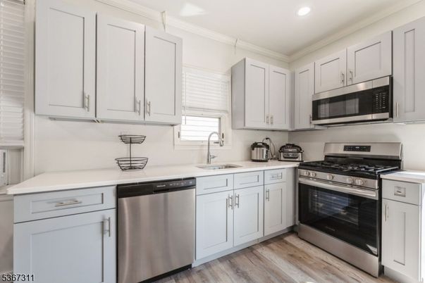 Interior, Kitchen, Recessed Lighting, Stainless Steel Appliances, Wood Texture Flooring