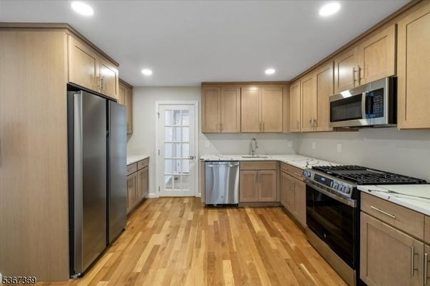 Interior, Kitchen, Recessed Lighting, Stainless Steel Appliances, Wood Texture Flooring