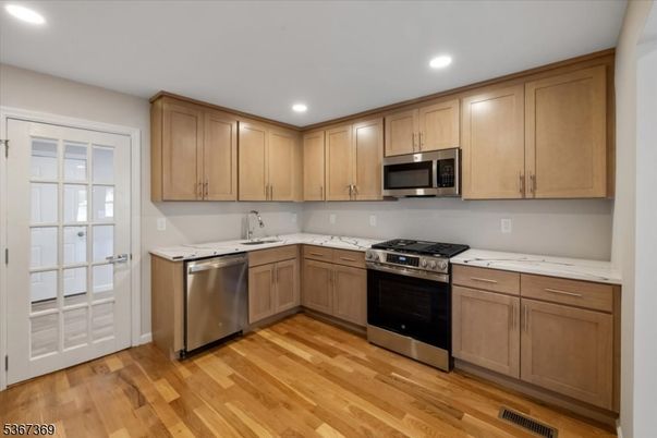 Interior, Kitchen, Recessed Lighting, Stainless Steel Appliances, Wood Texture Flooring