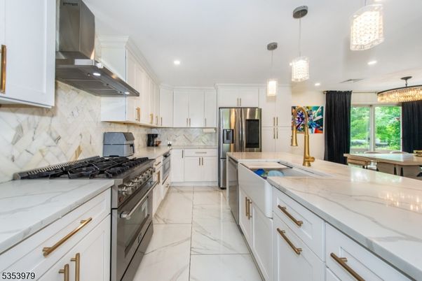 Interior, Kitchen, Marble, Marble Walls, Pendant Lights, Recessed Lighting, Stainless Steel Appliances