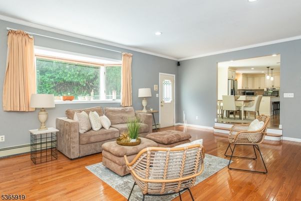 Dining room, Interior, Kitchen, Living room, Recessed Lighting, Stainless Steel Appliances, Wood Texture Flooring