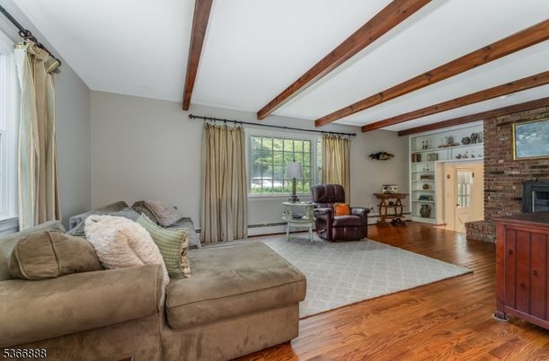 Fireplace, Interior, Living room, Stone Walls, Wooden Beams, Wood Texture Flooring