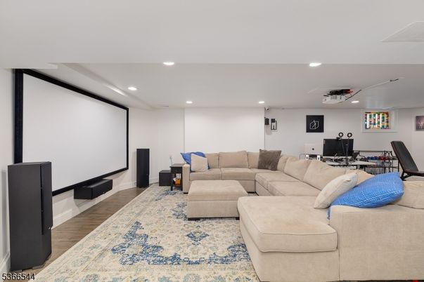 Interior, Living room, Projection Screen, Recessed Lighting, Wood Texture Flooring
