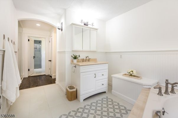 Bathroom, Dual Sink Vanities, Interior, Recessed Lighting, Wood Texture Flooring