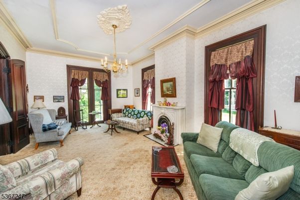 Chandelier, Fireplace, Interior, Living room