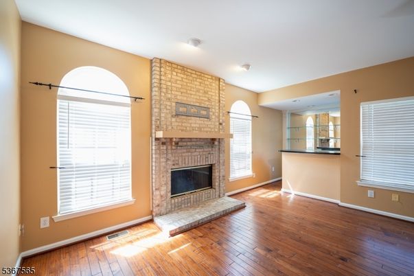 Empty room, Fireplace, Interior, Stone Walls, Wood Texture Flooring