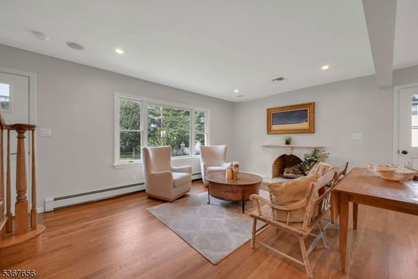 Fireplace, Interior, Living room, Recessed Lighting, Wood Texture Flooring