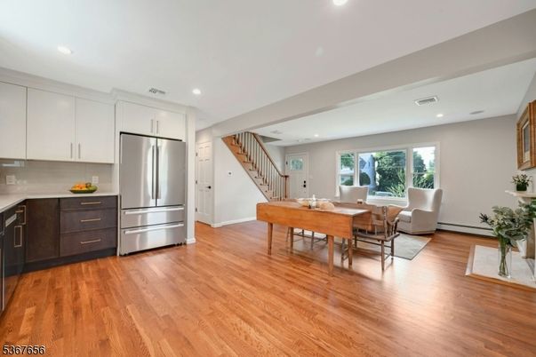 Dining room, Interior, Kitchen, Recessed Lighting, Stainless Steel Appliances, Wood Texture Flooring