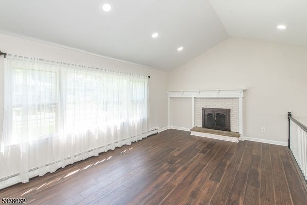 Empty room, Fireplace, Interior, Recessed Lighting, Wood Texture Flooring