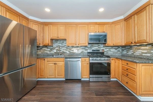 Interior, Kitchen, Recessed Lighting, Stainless Steel Appliances, Wood Texture Flooring