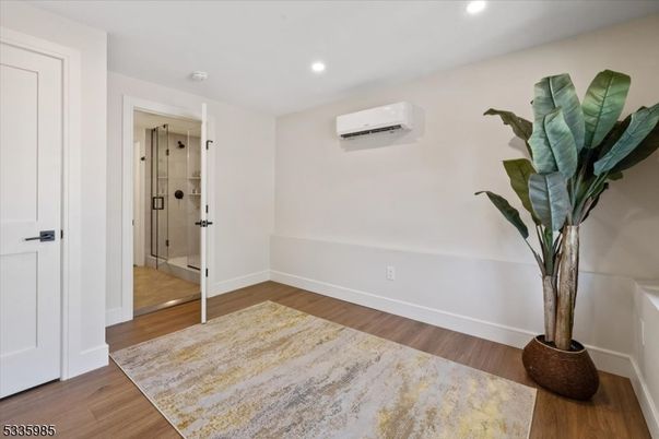 Bathroom, Glass Shower, Interior, Recessed Lighting, Wood Texture Flooring
