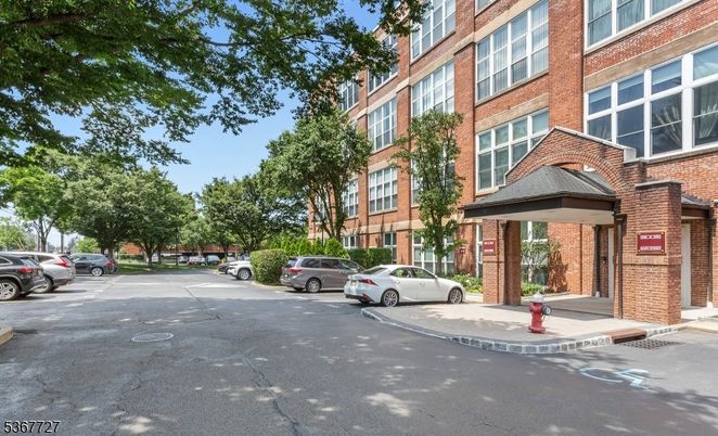 Exterior, Facade, Brick Facade, Condo Building