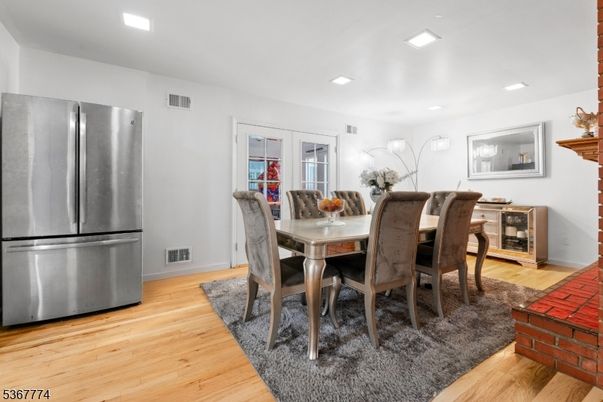Dining room, Interior, Kitchen, Recessed Lighting, Stainless Steel Appliances, Wood Texture Flooring