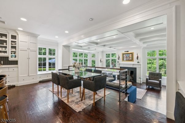 Dining room, Fireplace, Interior, Living room, Recessed Lighting, Wood Texture Flooring