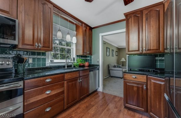 Interior, Kitchen, Stainless Steel Appliances, Tile Countertops, Wood Texture Flooring