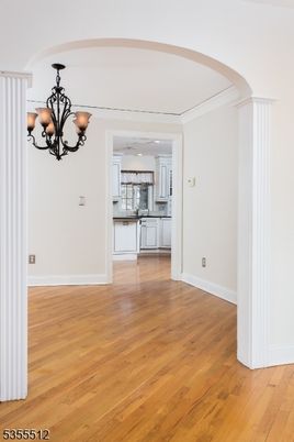 Chandelier, Empty room, Interior, Kitchen, Recessed Lighting, Wood Texture Flooring