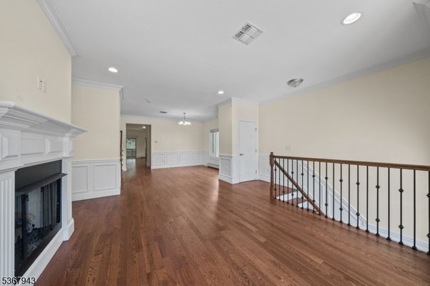 Chandelier, Empty room, Fireplace, Interior, Recessed Lighting, Wood Texture Flooring