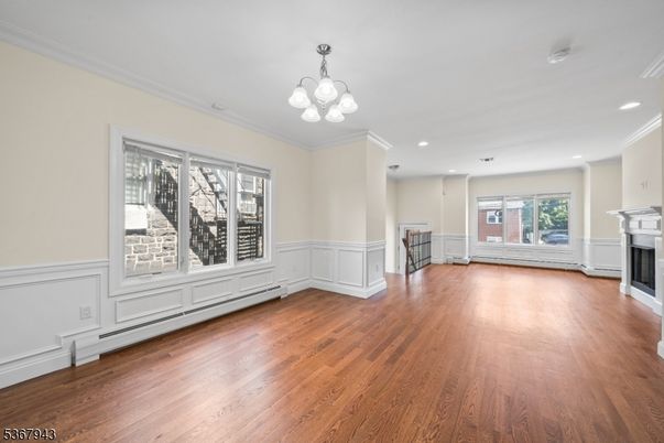 Empty room, Fireplace, Interior, Recessed Lighting, Wood Texture Flooring