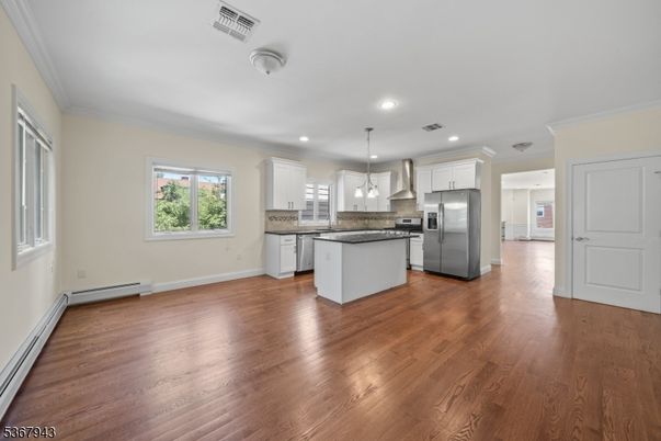 Interior, Kitchen, Pendant Lights, Recessed Lighting, Stainless Steel Appliances, Wood Texture Flooring