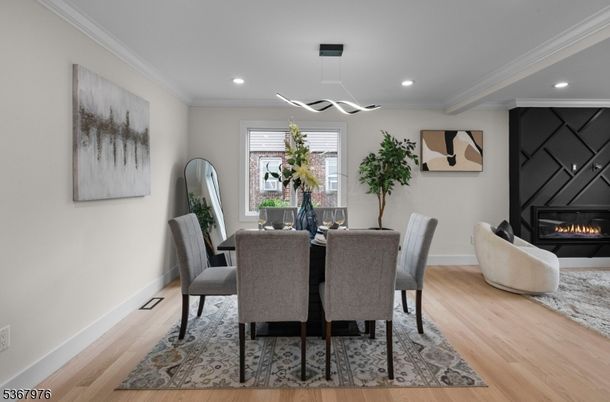 Dining room, Fireplace, Interior, Pendant Lights, Recessed Lighting, Wood Texture Flooring