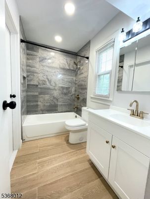 Bathroom, Interior, Marble Walls, Recessed Lighting, Wood Texture Flooring