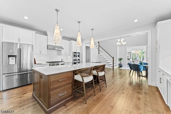 Chandelier, Interior, Kitchen, Pendant Lights, Recessed Lighting, Stainless Steel Appliances, Wood Texture Flooring