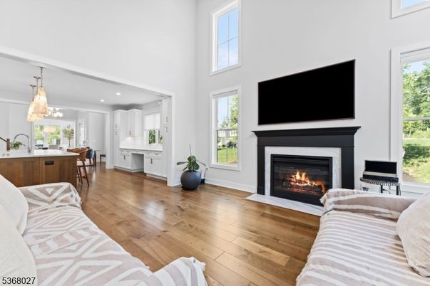 Fireplace, Interior, Pendant Lights, Recessed Lighting, Wood Texture Flooring