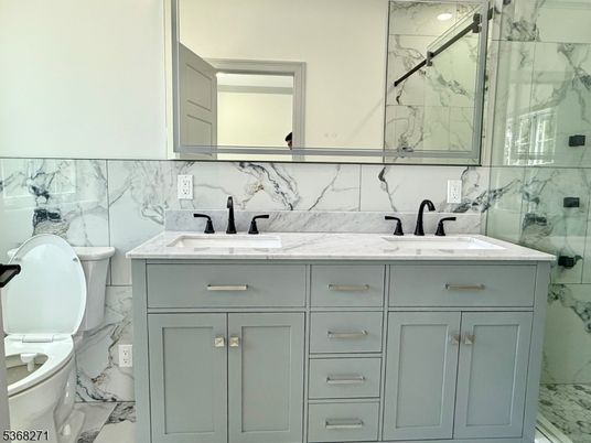 Bathroom, Dual Sink Vanities, Glass Shower, Interior, Marble, Marble Walls